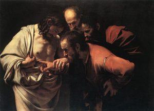 Peinture de Caravage intitulée “L'incrédulité de saint Thomas”