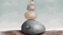 Pierres et de galets empilés sur du sable, technique de dessin minimaliste