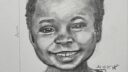 J 16 Visage souriant